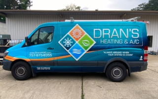 Dran’s Heating & Cooling service truck outside a Newport News home for emergency furnace repair.