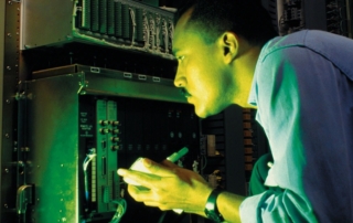 HVAC technician performing fall furnace maintenance in Newport News, VA.