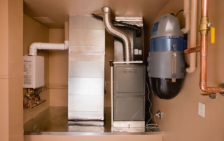 Comparison of an older furnace and a new energy-efficient model installed in a Newport News home.